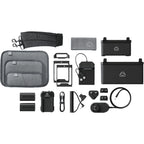 Atomos Universal Accessory Kit for video accessories, includes various mounts and cables, displayed on a white background.