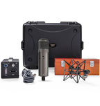 Warm Audio WA-47T condenser microphone shown with black body and vintage-style grille, ideal for studio recording.