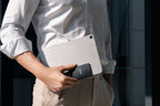 Lexar SL500 portable SSD external drive with sleek black design and USB-C interface, shown on a modern workspace.