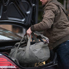 Think Tank Retrospective Duffel for video equipment, showing its spacious design and durable fabric with multiple compartments.