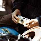Kodak EKTAR H35 Half Frame Compact Camera for instant photography, showing its sleek design and lens on a neutral background.