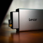 Lexar Workflow Go docking station with dual module bay, USB hub and multiple ports for data transfer and device connectivity.