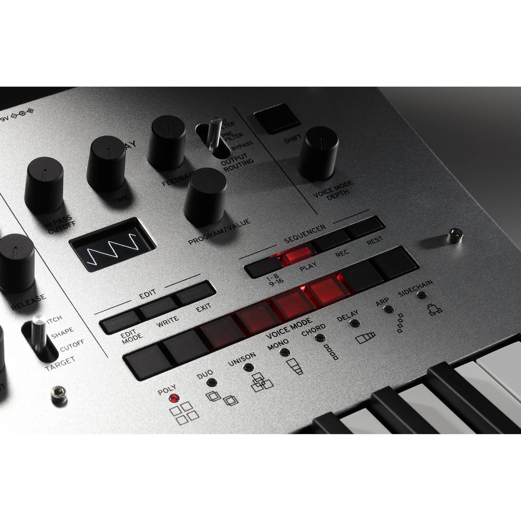 Korg Minilogue synthesizer with knobs and controls, compact electronic music instrument for sound creation and modulation.