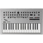 Korg Minilogue synthesizer with black controls and compact design, showing knobs and input/output jacks on the front panel.