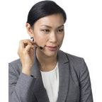 Rode HS2 lavalier microphone clipped to a person, showing its compact wearable design and microphone capsule for professional audio.