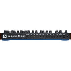 Novation Peak synthesizer with multiple knobs, buttons, and a large display screen, showing its professional audio interface.