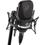 Neumann TLM 107 condenser microphone in studio setup, showing its sleek design and professional-grade build.