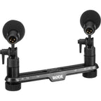 Rode TF-5 condenser microphone with black body and grille, mounted on a stand for professional audio recording or broadcasting.