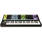 Moog Matriarch synthesizer with keyboard and patch cables displayed on a stand, showing its knobs and control panel.
