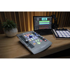 Presonus iOStation 24c DAW controller with multiple knobs, faders, and interface ports for music production and audio editing.