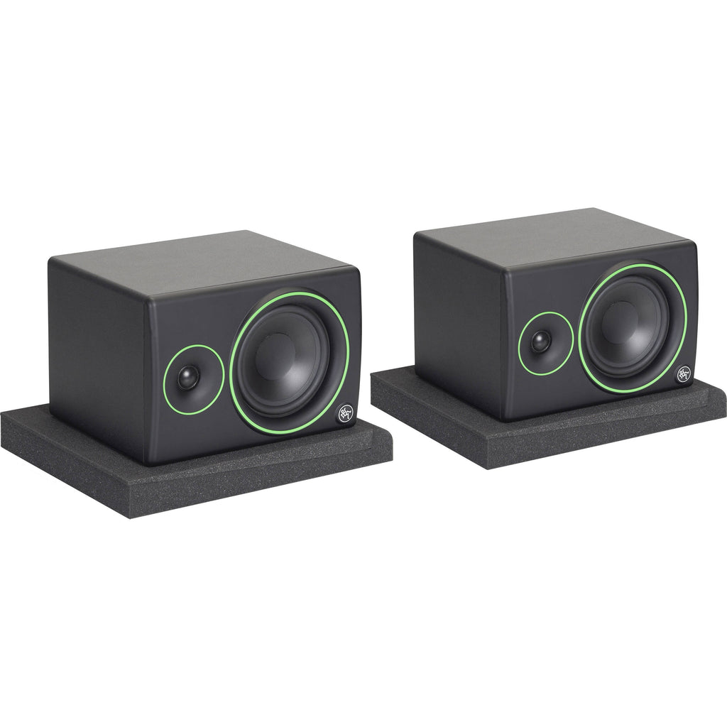Gator Studio Monitor Isolation Pads on black studio monitor stands for improved sound isolation and stability.