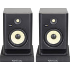Gator Studio Monitor Isolation Pads placed on studio monitor stands to reduce vibrations and improve sound clarity.