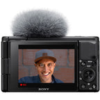 Sony ZV-1 compact video camera with lens and flip-out screen, ideal for vlogging and high-quality video recording.