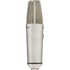 Warm Audio WA-87 R2 condenser microphone shown with metal body and grille, ideal for studio recording and vocals.