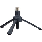 Zoom ZDM-1 Podcast Mic Pack studio bundle featuring microphone, pop filter, and adjustable stand on a wooden table.