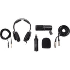 Zoom ZDM-1 Podcast Mic Pack studio bundle featuring microphone, pop filter, and adjustable mic stand on a wooden surface.