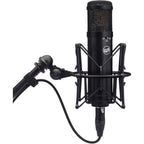 Warm Audio WA-47jr condenser microphone with vintage-style metal body and detachable shock mount for studio recording.
