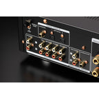 Marantz PM6007 stereo amplifier with controls and display, showcasing its sleek black design and input options.