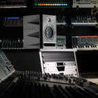 Focal Alpha 50 Evo active nearfield monitor speaker showing its front grille and control panel for studio audio use.