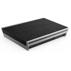 Bang & Olufsen Beosound Level wireless speaker with sleek design and fabric covering, showcasing modern home audio equipment.