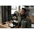 Shure MV7X dynamic microphone with black finish, featuring a cardioid capsule and professional audio equipment design.
