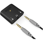 Rode AI-Micro audio interface with compact design, multiple input ports, and professional audio equipment for streaming and recording.