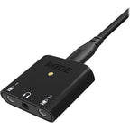 Rode AI-Micro audio interface with compact design, multiple input ports, and professional-grade audio equipment.