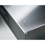 Technics SC-C70MK2 CD player with sleek design, front-loading disc slot, and control buttons on a modern audio device.