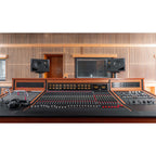 Adam Audio A8H mid-field main monitor speaker, left speaker showing a sleek black enclosure with control panel and driver components.