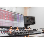 Adam Audio A8H right mid-field and main monitor speaker showing sleek black enclosure and detailed driver components.