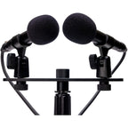 Zoom ZPC-1 shotgun microphone attached to a camera, showcasing its sleek design and professional audio recording capabilities.