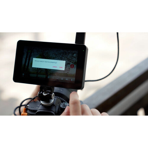 YoloLiv YoloBox Mini video monitor with touchscreen display, compact design, and control buttons for live streaming and video production
