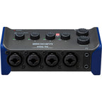 Zoom AMS-44 audio interface with multiple inputs, sleek design, and LED indicators for professional sound recording.
