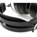 Audeze MM-500 studio headphones with over-ear design and sleek black finish, featuring large ear cups and adjustable headband.