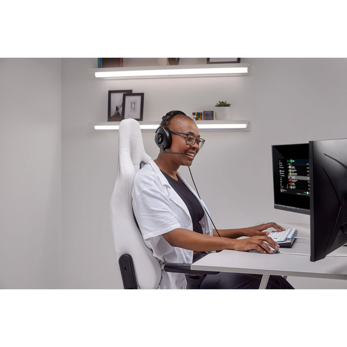 Rode NTH-100M gaming headphones with over-ear design, black and gray color, featuring adjustable headband and cushioned ear cups.