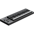 Expressive E Osmose 49 synthesizer with keyboard, compact design, and control knobs, showcasing its expressive performance features.