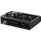 Audient iD24 audio interface shown with multiple input and output ports, compact design, and professional audio equipment features.