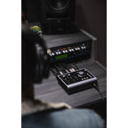 Audient iD24 audio interface with multiple input/output ports and control knobs, designed for music production and recording.