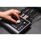 Audient iD24 audio interface with multiple input and output ports, compact design, and professional recording features.