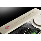 Neumann MT 48 audio interface with multiple input and output ports, compact design, and professional-grade audio equipment.