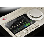 Neumann MT 48 audio interface with multiple input and output ports, digital display, and sleek black design.