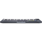 Novation FLkey 61 MIDI keyboard with black keys and control knobs, designed for music production and live performance.