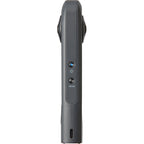 Ricoh Theta X 360-degree video camera with front view showcasing lens and compact design for immersive video recording.