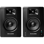 M-Audio BX4 BT desktop speakers with black finish, compact design, and control knobs on the front for audio adjustments.