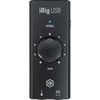 IK Multimedia iRig USB audio interface with input and output ports, compact design for mobile recording and sound setup.