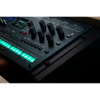 Korg Opsix synthesizer module with colorful control knobs and input/output ports, designed for electronic music production.