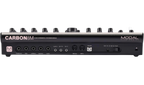 Modal Electronics Carbon8M desktop synthesizer with control knobs, buttons, and a digital display on a sleek black panel.