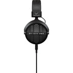 Beyerdynamic DT 1990 Pro MK2 studio headphones with open-back design, silver ear cups, and adjustable headband.