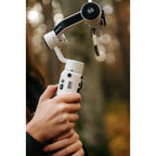 Zhiyun Smooth 5S stabilizer gimbal with ergonomic handle and adjustable mount for smooth video recording and camera stabilization.