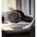 Sennheiser HD 660S2 open-back headphones with large ear cups and sleek design, showcasing high-fidelity audio quality.